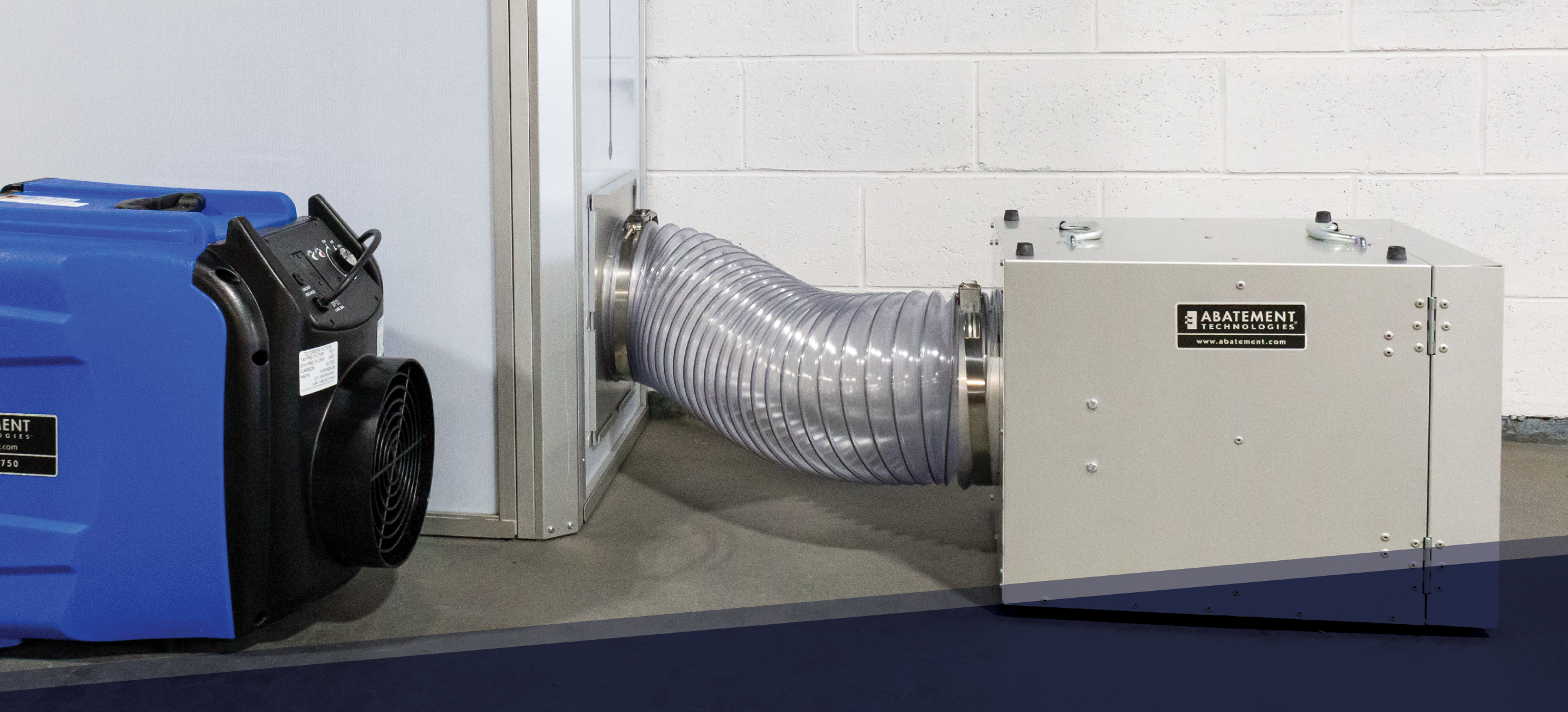 HEPA-filtered negative air machine and dehumidifier connected to a containment system in a hospital or restoration setting, showcasing advanced air filtration and moisture control equipment